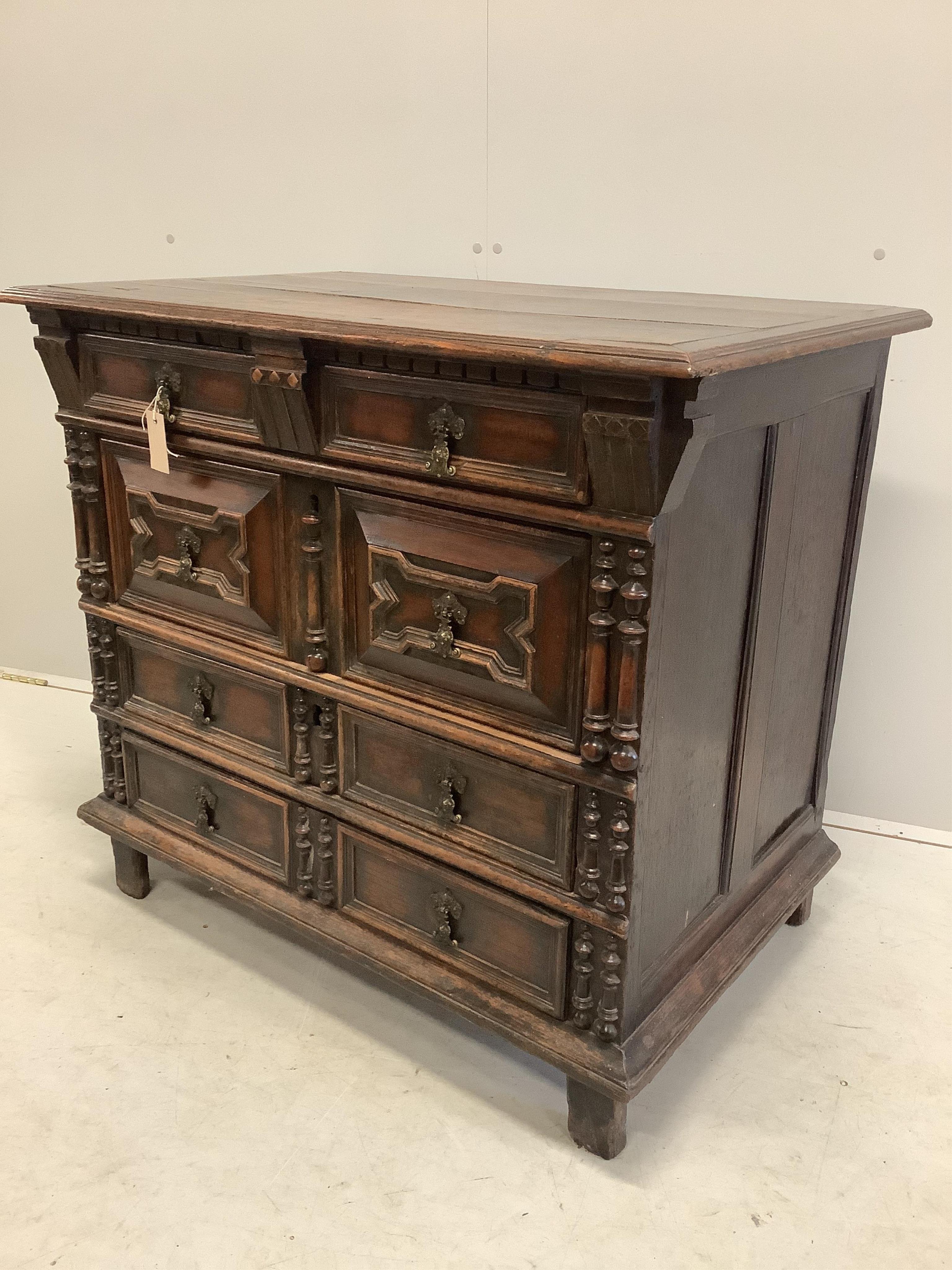 An 18th century oak block front chest of drawers, width 96cm, depth 61cm, height 85cm. Condition - fair to good